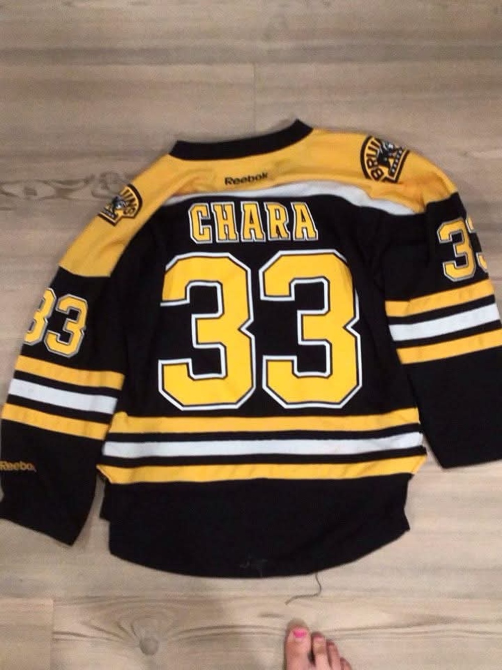 Reebok Youth Hockey Jersey in Black & Gold
